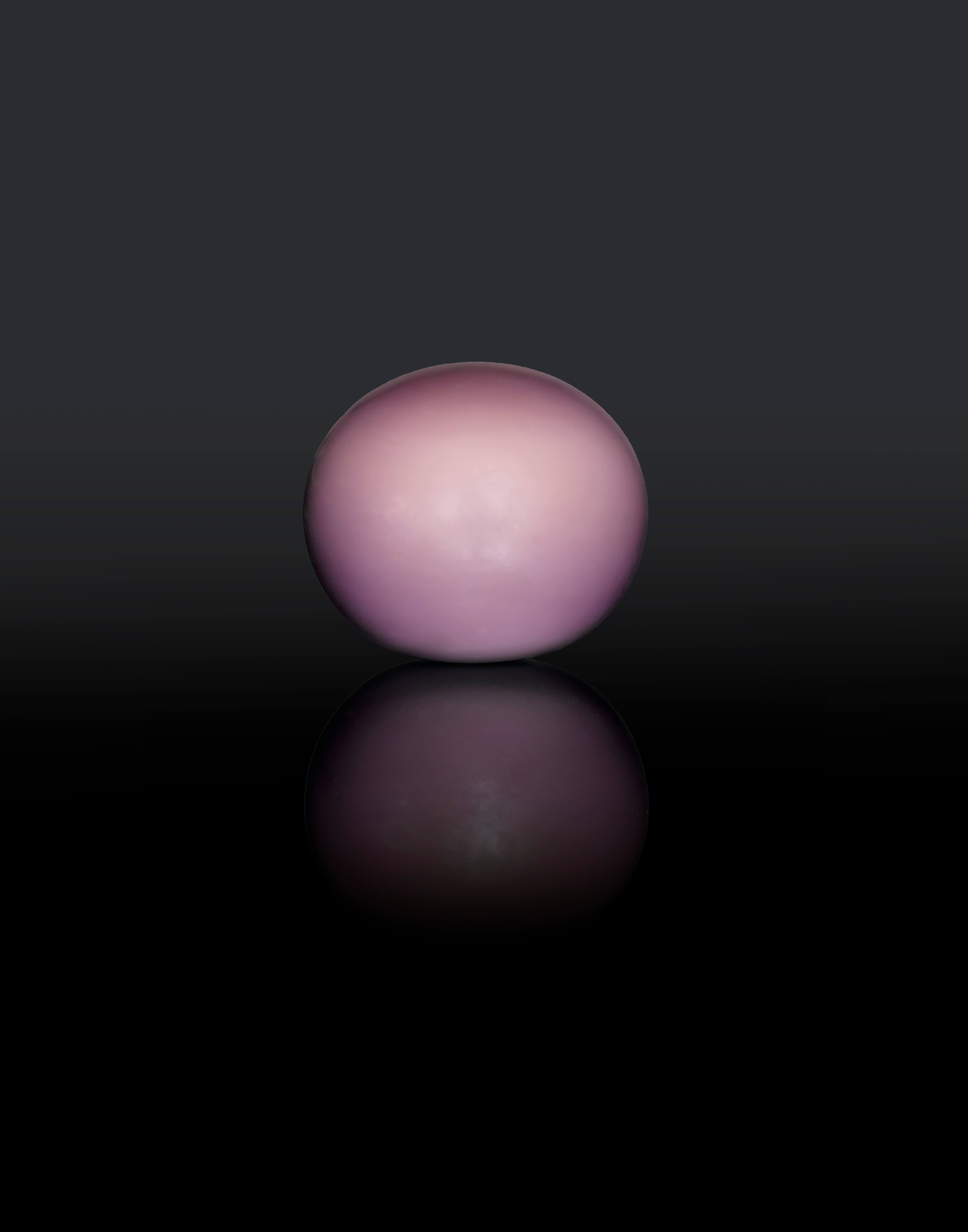 A rare, purple non-nacreous Quahog Pearl.